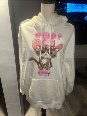 No Boundaries Cream Hoodie with Pink Cat Cowboy Graphic